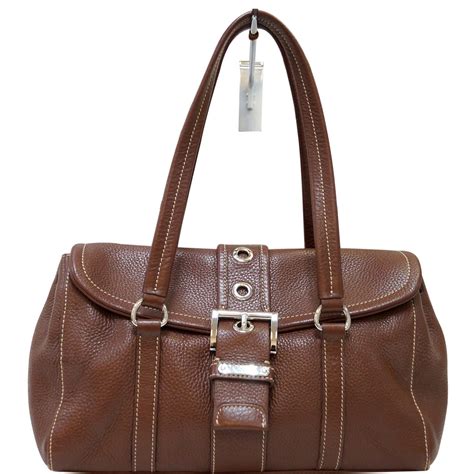 brown leather prada travel bag|prada brown purse.